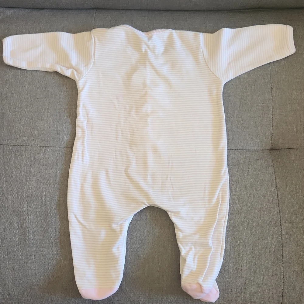 One Piece footed soft pink bodysuit